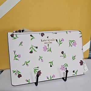 KATE SPADE NWT wrislet, flowe lavender color.